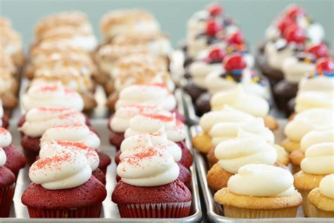 Cupcake city - We bake 16 different flavors each day available in our store front. When placing a cupcake order you have to order in sets of 4 of the same flavor for regular size and 12 of the same flavor for mini cupcakes. For weddings you can pick 3-5 flavors. $2.50 each. 